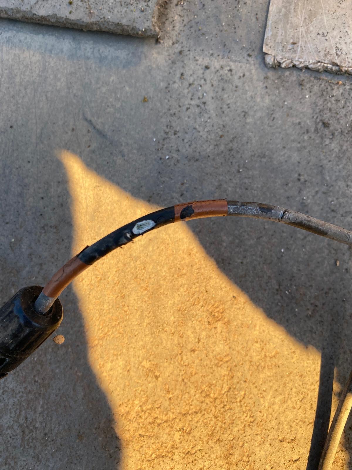 Chafed and perished cable